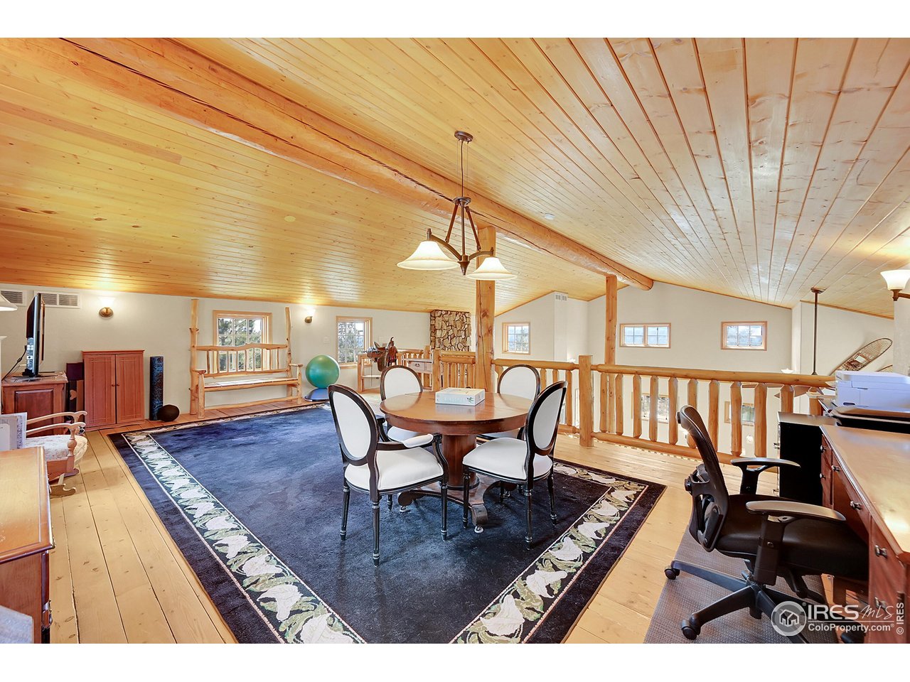 1319 County Road 83 Boulder, CO 80302 - Photo 14 of 30 a dining room with furniture and wooden floor