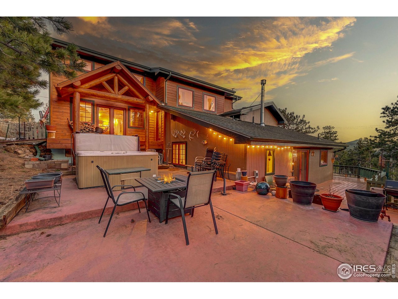 1319 County Road 83 Boulder, CO 80302 - Photo 2 of 30 a view of a patio with table and chairs