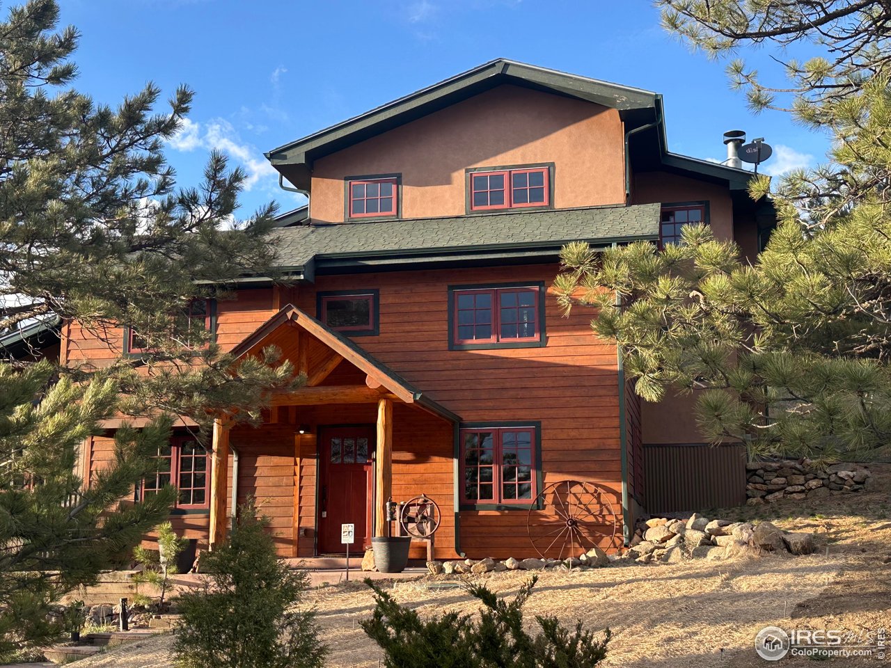 1319 County Road 83 Boulder, CO 80302 - Photo 30 of 30 a front view of a house with a yard