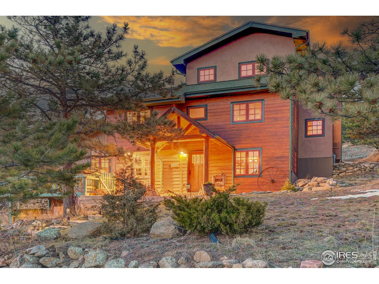 1319 County Road 83 Boulder, CO 80302 - Photo 4 of 30 a front view of a house with a yard