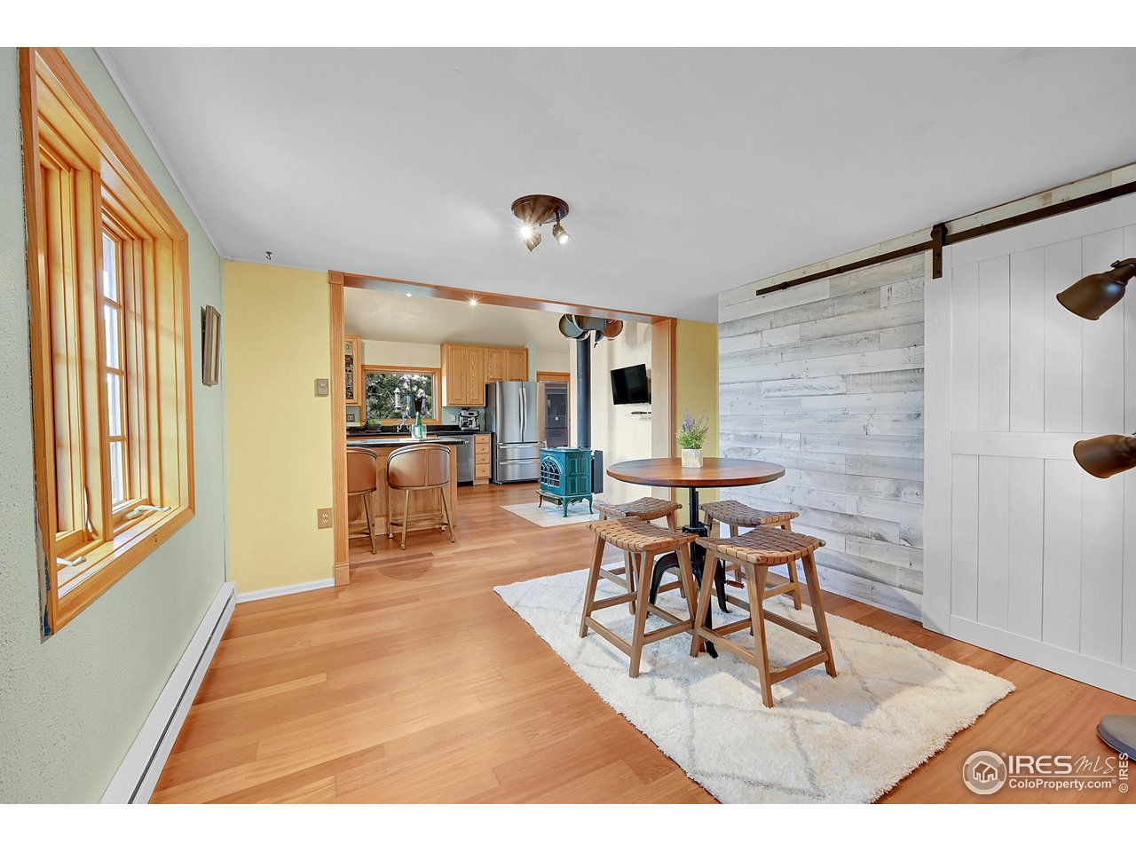 1319 County Road 83 Boulder, CO 80302 - Photo 10 of 30 a dining room with a table and chairs