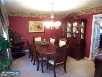 23 Tweed Road Levittown, PA 19056 - Photo 6 of 12 a view of a dining room with furniture and chandelier