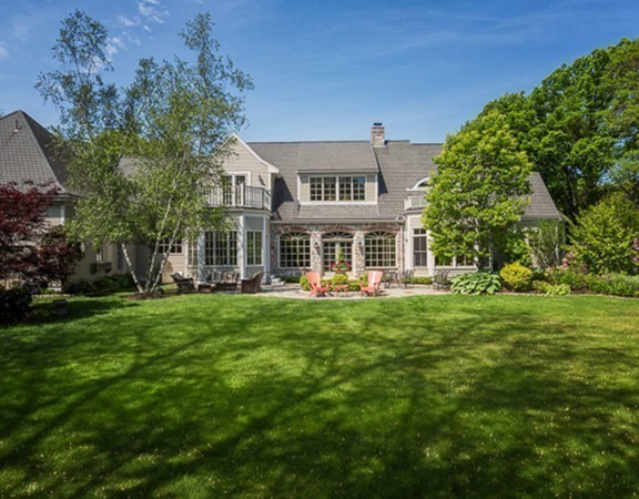 7 Brent Road Lexington, MA 02420 - Photo 4 of 14 a front view of a house with a garden