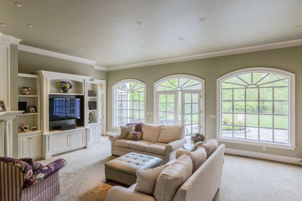 7 Brent Road Lexington, MA 02420 - Photo 7 of 14 a living room with furniture and a flat screen tv