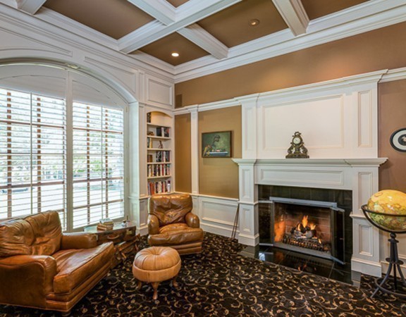 7 Brent Road Lexington, MA 02420 - Photo 8 of 14 a living room with furniture a fireplace and a large window