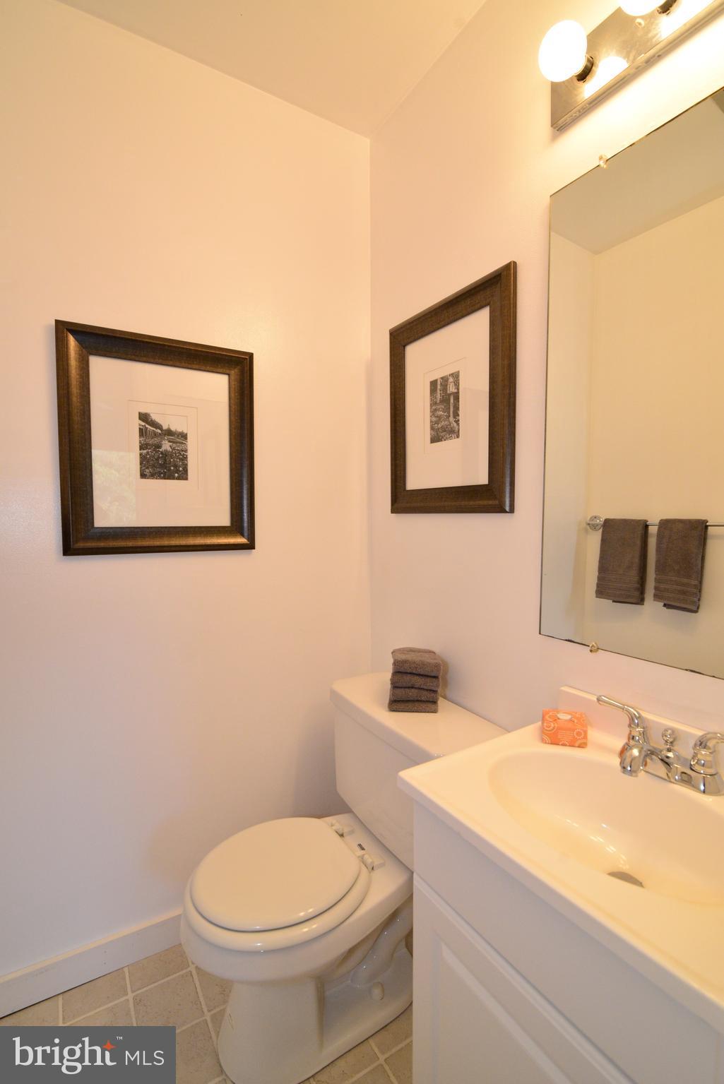 11803 Breton Court, Unit 32C Reston, VA 20191 - Photo 16 of 23 a bathroom with a toilet and a sink
