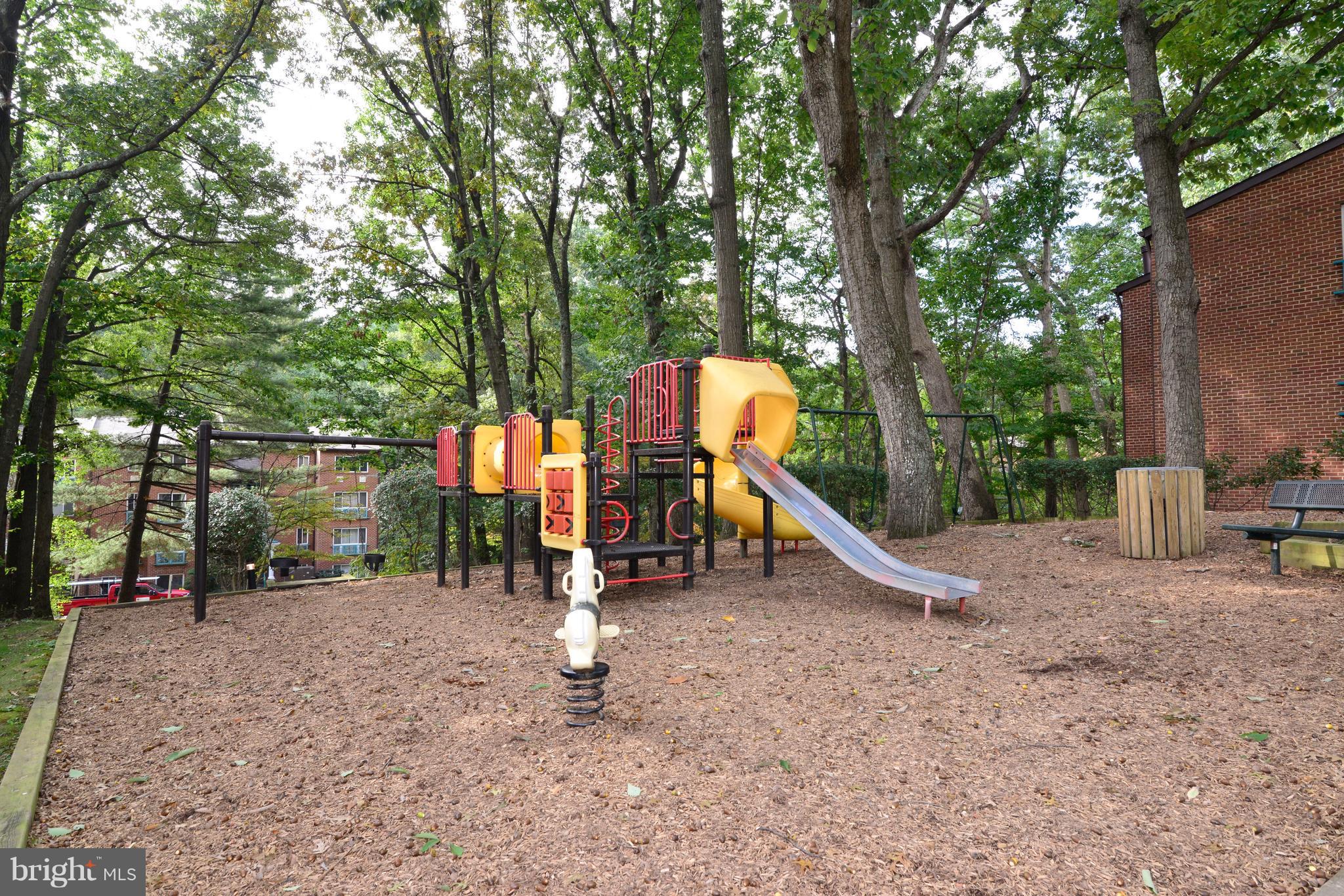 11803 Breton Court, Unit 32C Reston, VA 20191 - Photo 22 of 23 a view of a park with slide