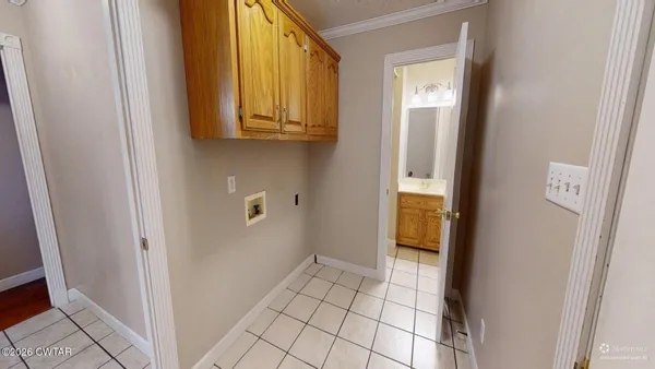 a bathroom with a toilet a sink and a mirror