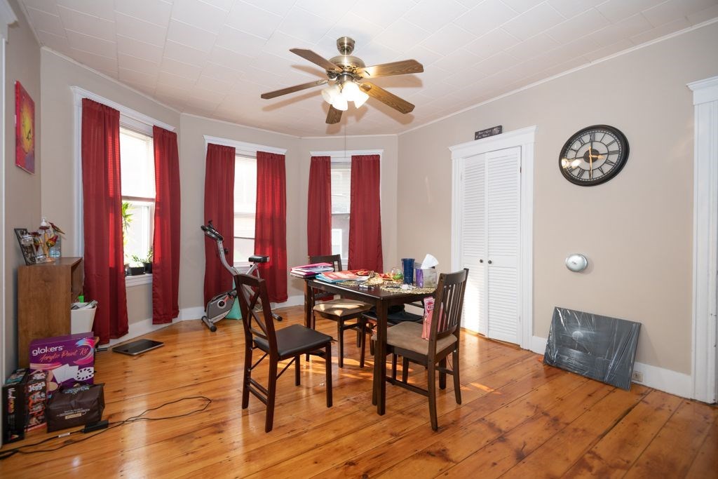 39 King Philip Road Worcester, MA 01606 - Photo 4 of 13 a view of a dining room with furniture and chandelier