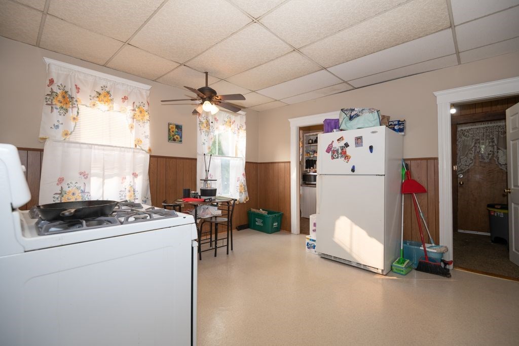 39 King Philip Road Worcester, MA 01606 - Photo 7 of 13 a kitchen that has a refrigerator and a stove