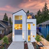 an aerial view of a house with swimming pool