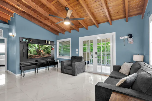 a bedroom with a bed and a table