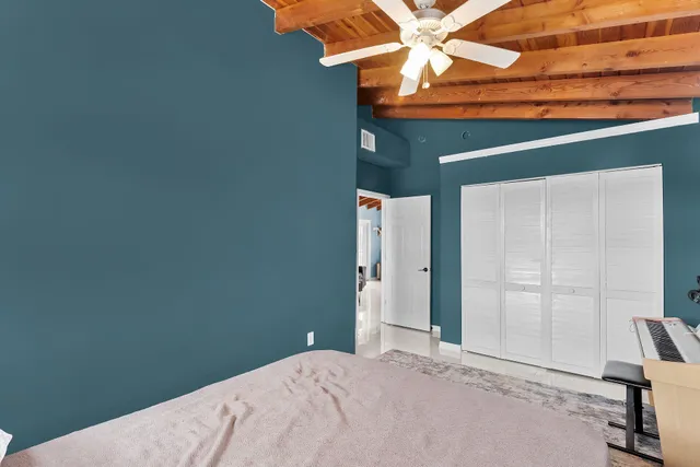 a bathroom with a sink toilet and a mirror