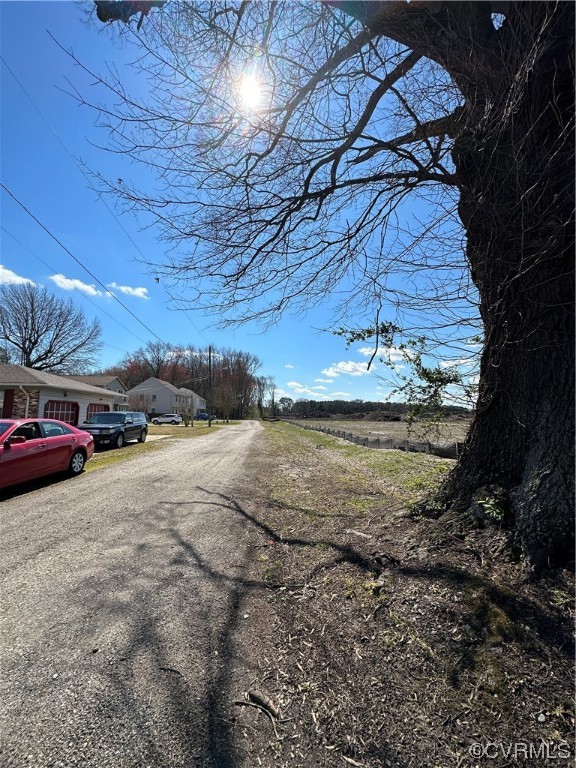 890 Shell Road Hampton, VA 23661 - Photo 3 of 7 a view of car parked on the side of the road