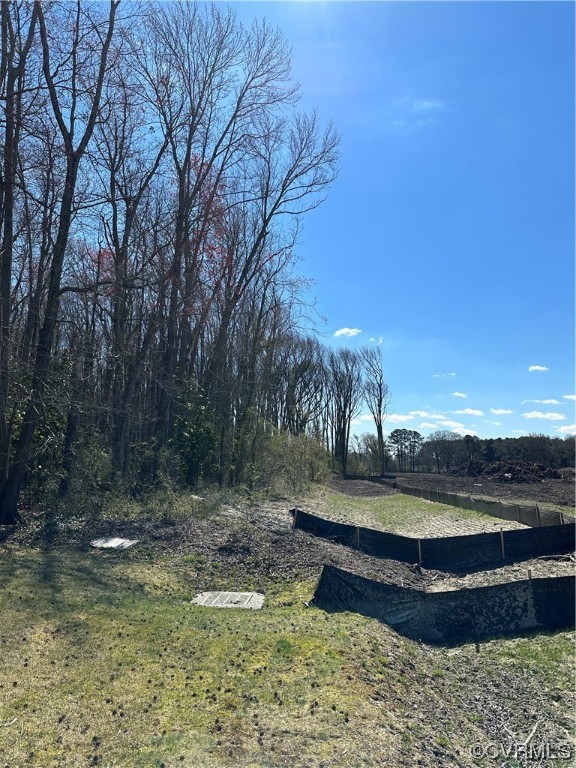 890 Shell Road Hampton, VA 23661 - Photo 5 of 7 a view of a lake with tall trees