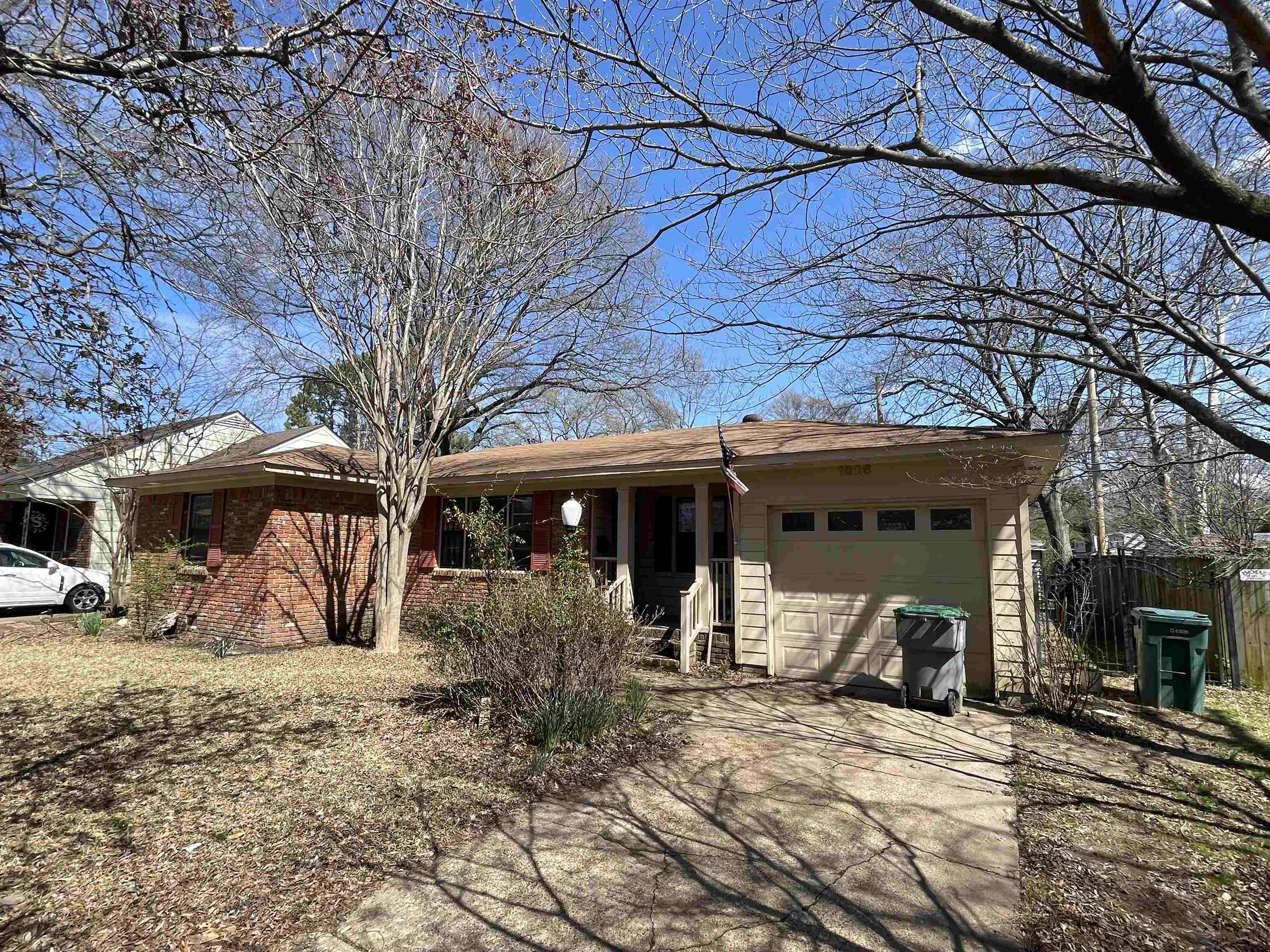1626 Wheaton Street Memphis, TN 38117 - Photo 2 of 12 a view of a house with a yard
