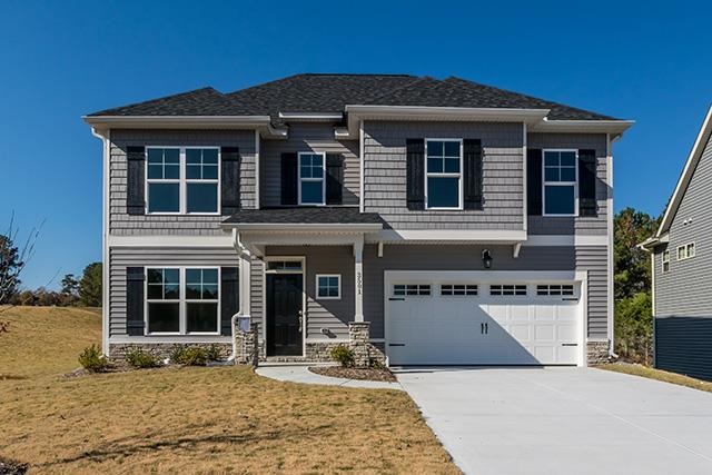 3501 Bloomfield Way Raleigh, NC 27616 - Photo 1 of 25 a front view of a house with garden
