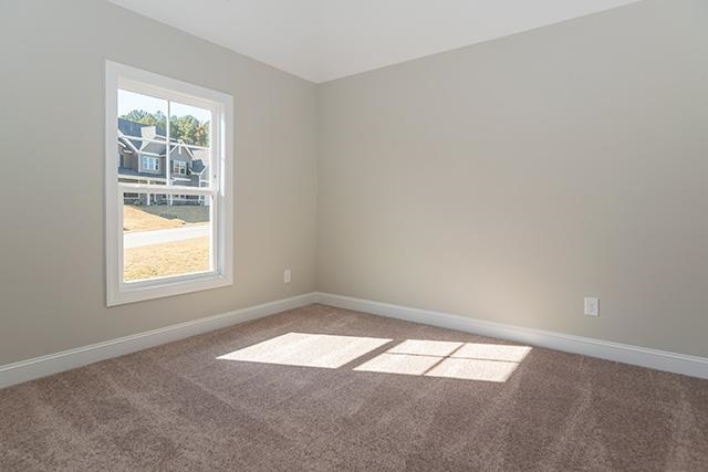 3501 Bloomfield Way Raleigh, NC 27616 - Photo 16 of 25 an empty room with a window