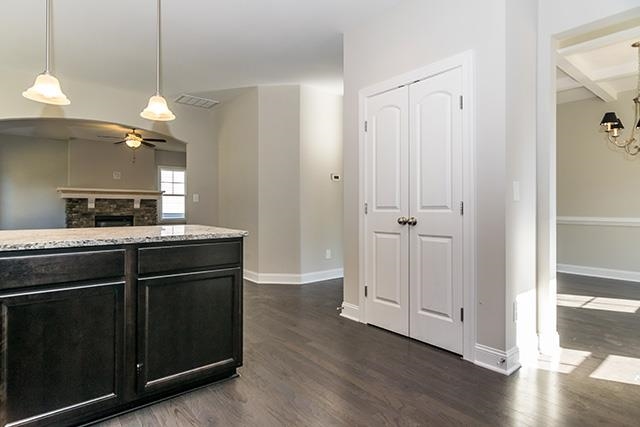 3501 Bloomfield Way Raleigh, NC 27616 - Photo 7 of 25 a kitchen with a refrigerator and a sink