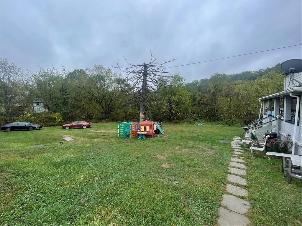 102 Francis Mine State Road Burgettstown, PA 15021 - Photo 18 of 18 a backyard of a house with table and chairs
