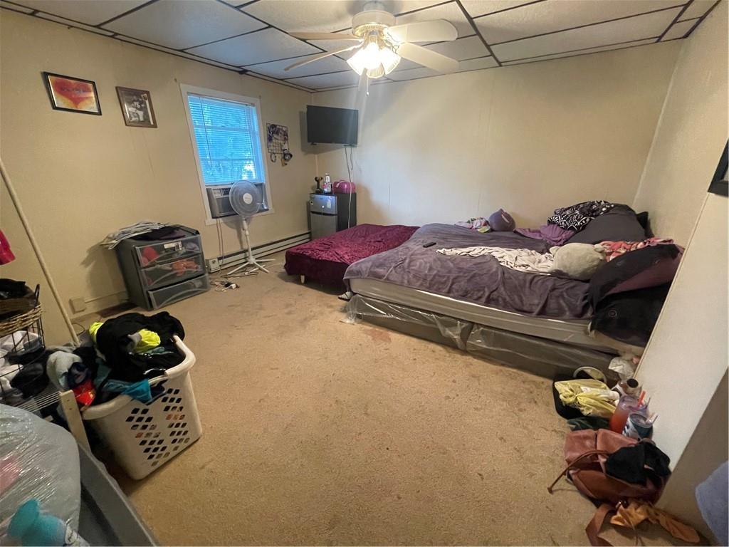 102 Francis Mine State Road Burgettstown, PA 15021 - Photo 9 of 18 a bedroom with a bed and a chandelier