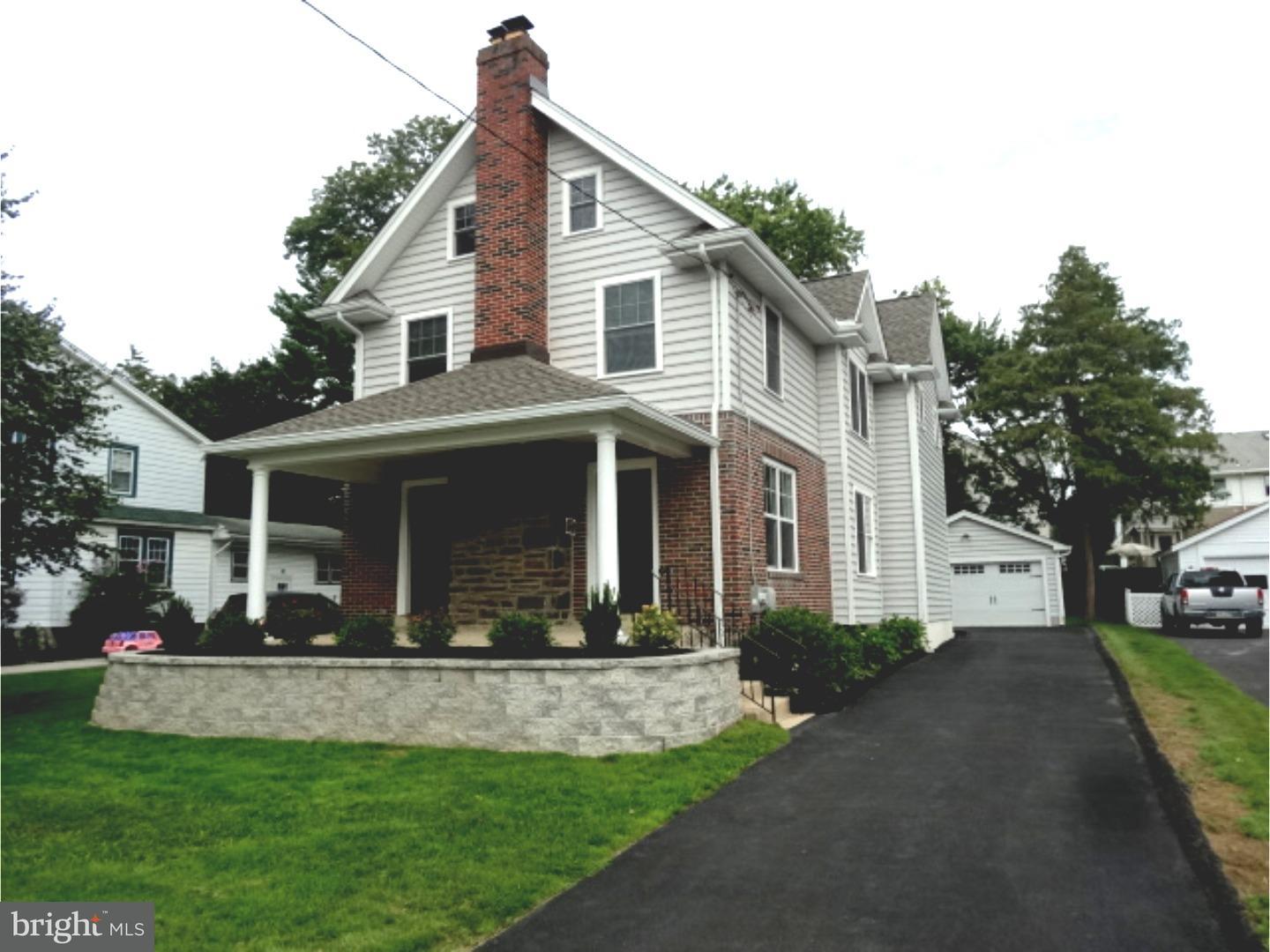 324 Lenox Road Havertown, PA 19083 - Photo 1 of 25 a front view of a house with a yard