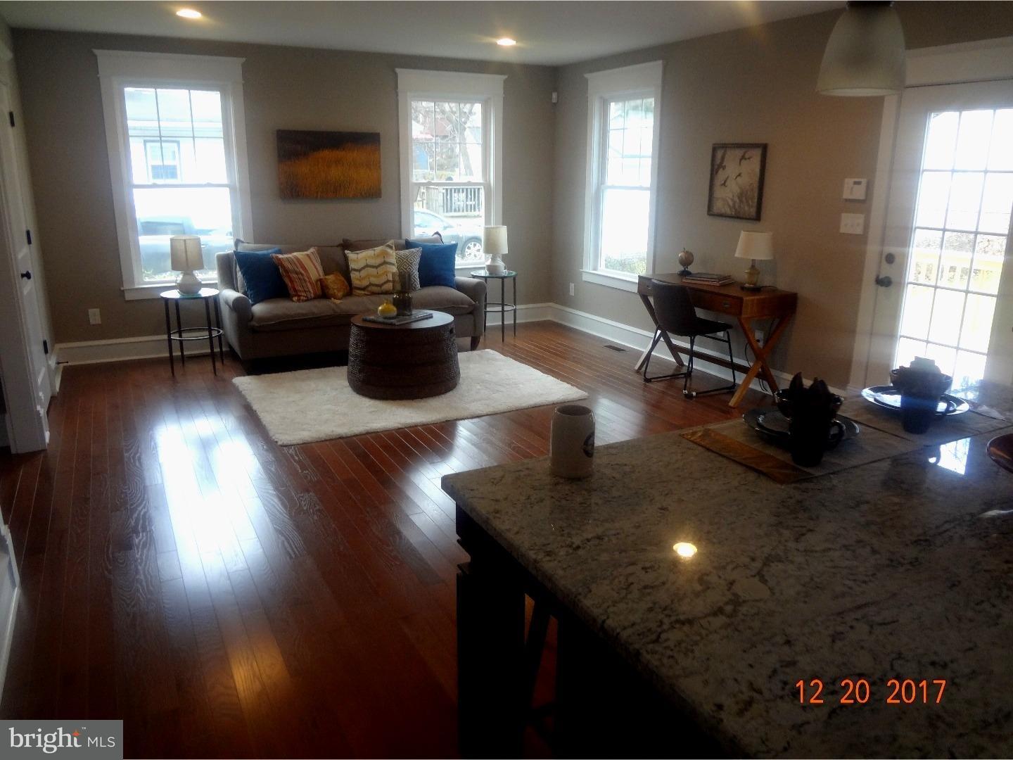 324 Lenox Road Havertown, PA 19083 - Photo 2 of 25 a living room with furniture and a wooden floor