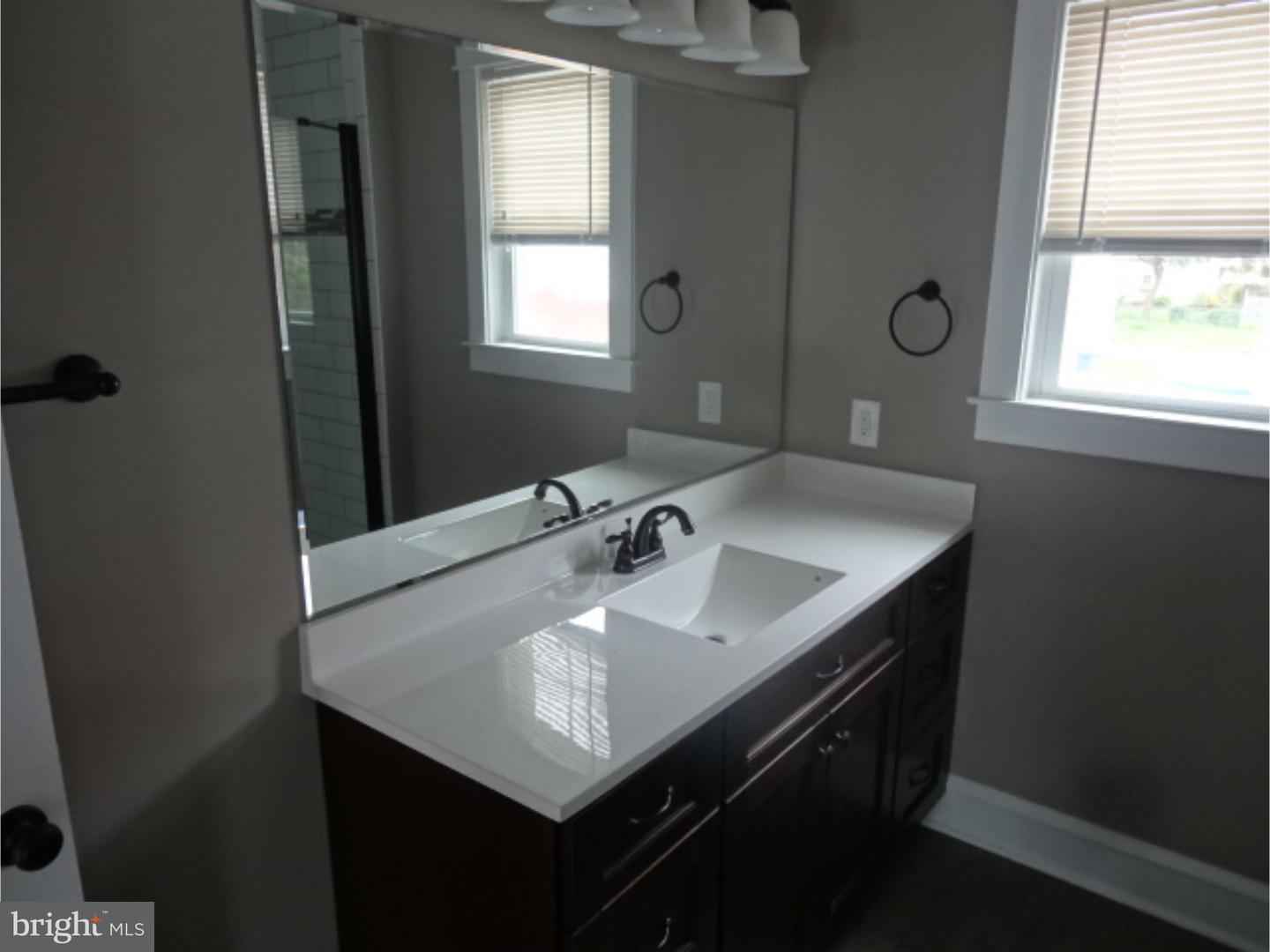 324 Lenox Road Havertown, PA 19083 - Photo 21 of 25 a close view of table chair and window