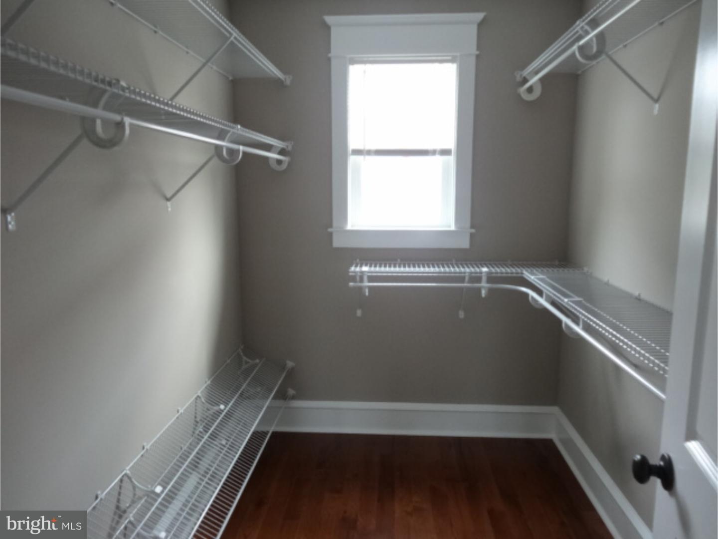 324 Lenox Road Havertown, PA 19083 - Photo 22 of 25 a view of an empty room with a window