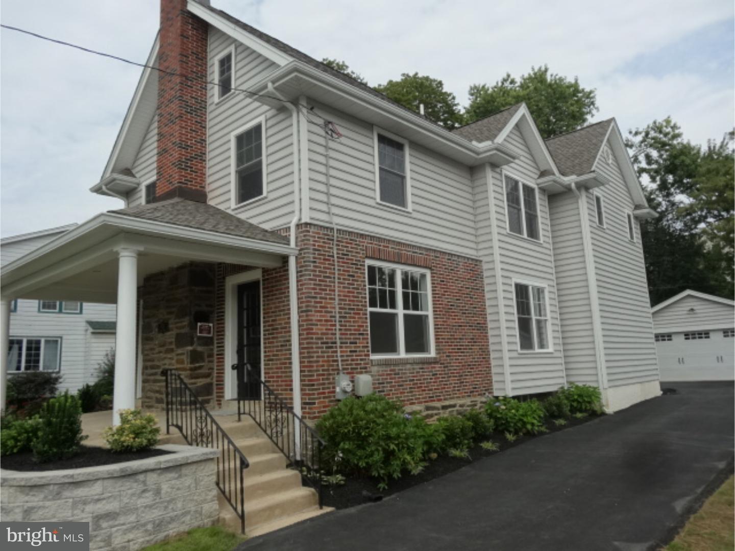 324 Lenox Road Havertown, PA 19083 - Photo 24 of 25 a front view of a house with garden