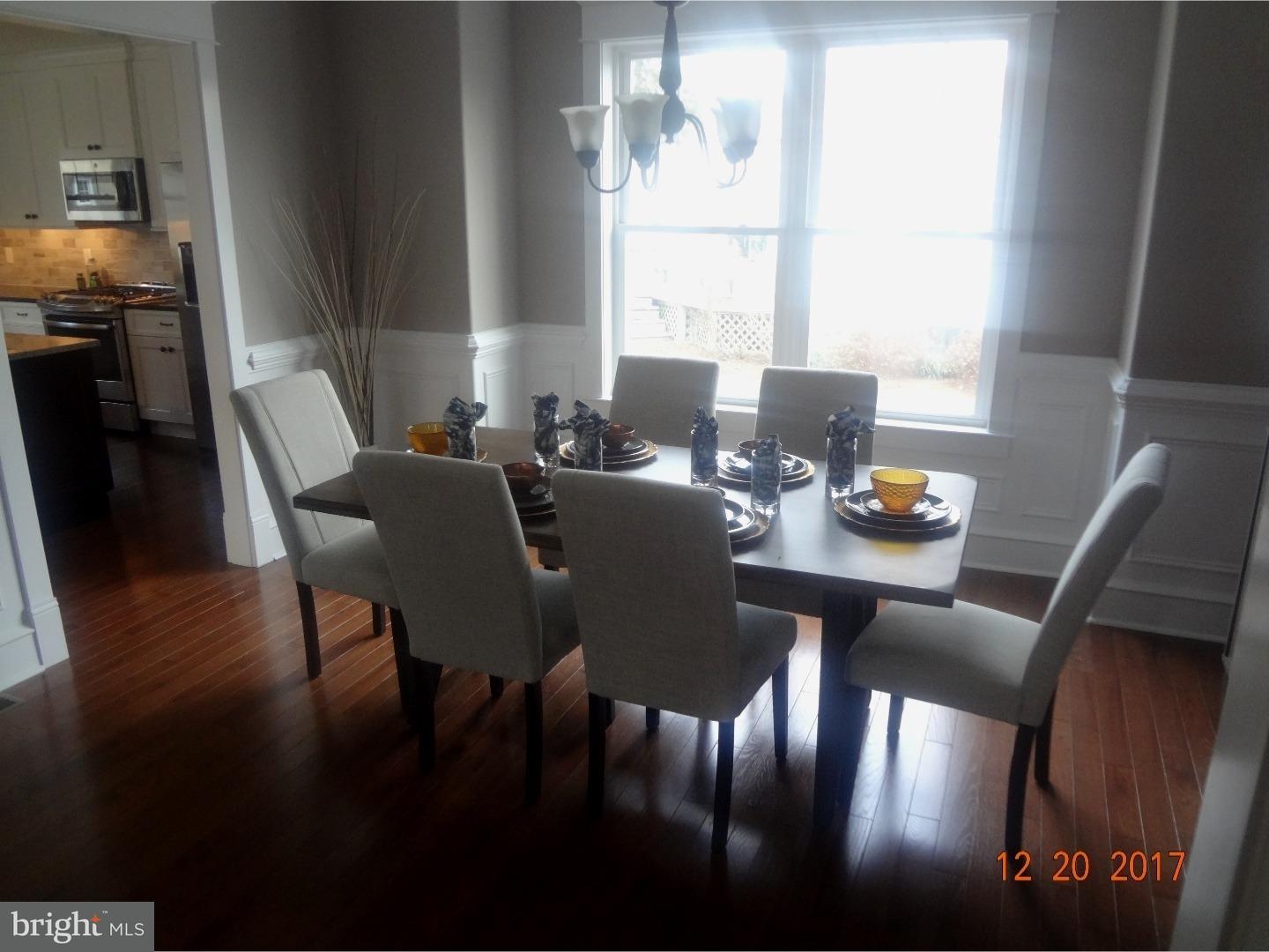 324 Lenox Road Havertown, PA 19083 - Photo 7 of 25 a view of a dining room with furniture window and wooden floor