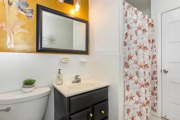 a bathroom with a sink and a toilet