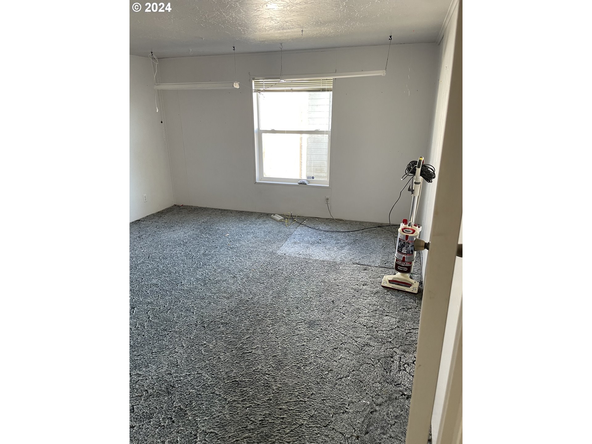 55096 Harrison Road Southwest Bandon, OR 97411 - Photo 24 of 34 a view of a room with a window