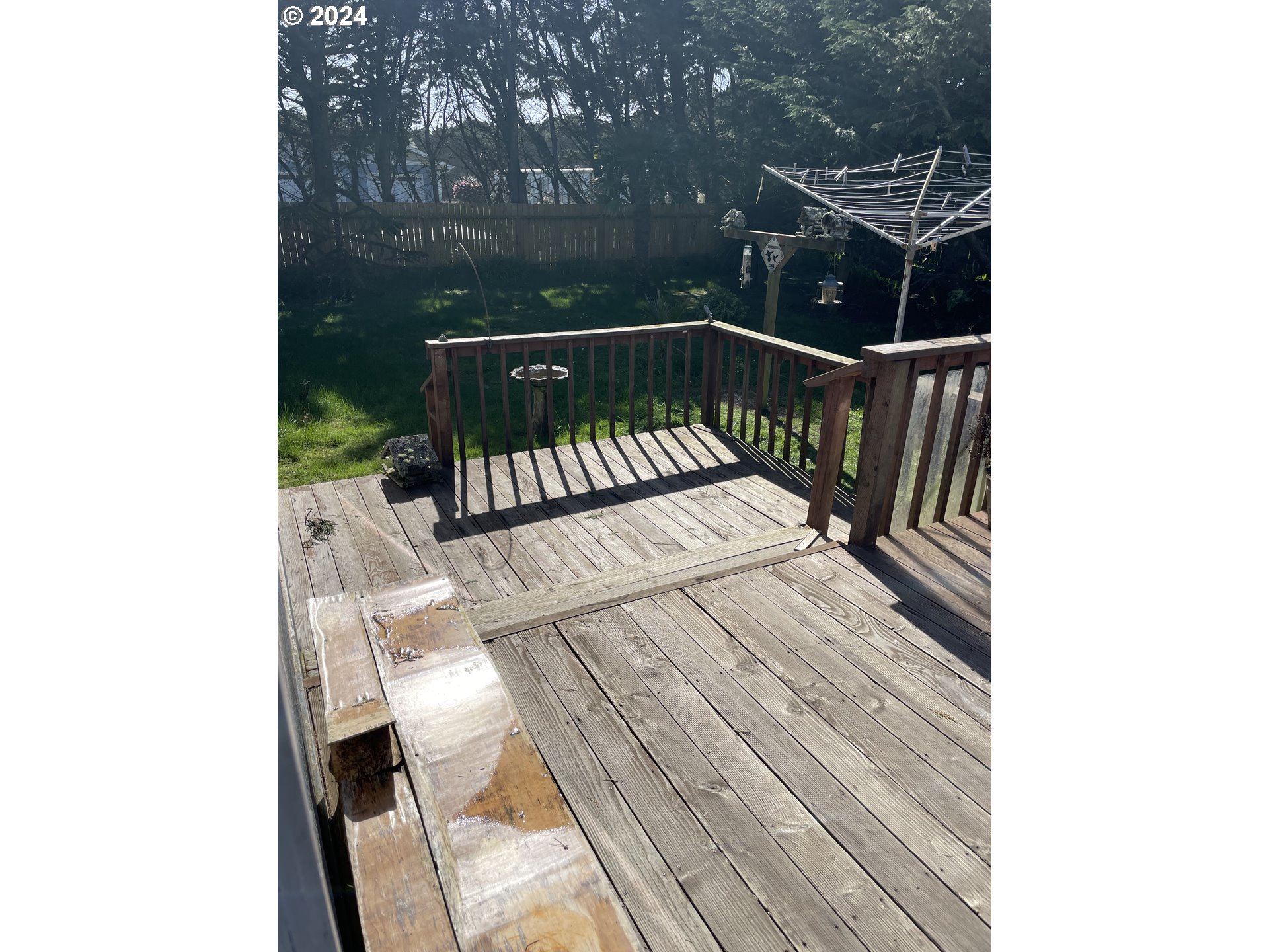 55096 Harrison Road Southwest Bandon, OR 97411 - Photo 27 of 34 a view of balcony with wooden floor