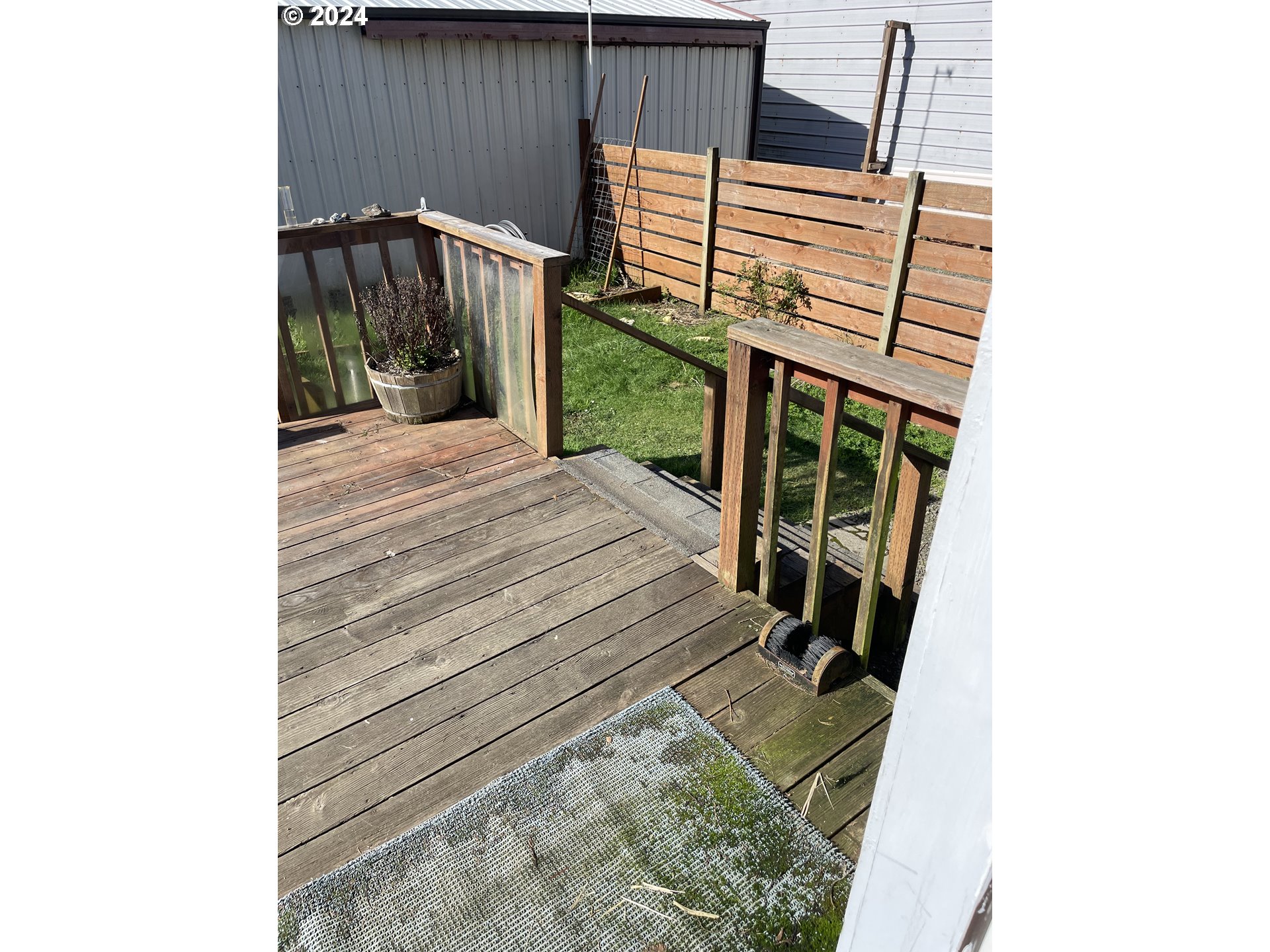 55096 Harrison Road Southwest Bandon, OR 97411 - Photo 28 of 34 a view of a backyard with sitting area