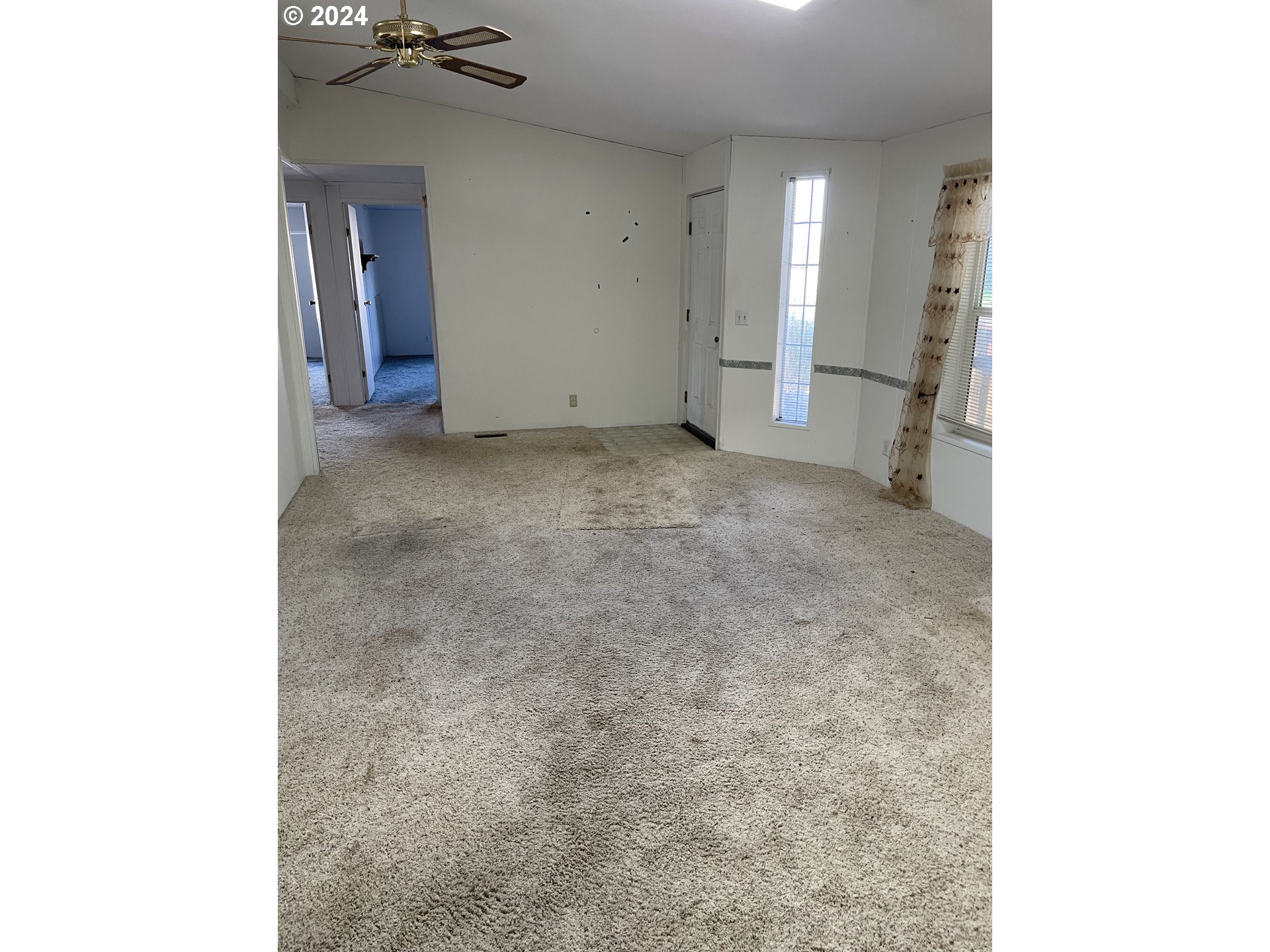 55096 Harrison Road Southwest Bandon, OR 97411 - Photo 5 of 34 a view of a room that has a lot of cabinets