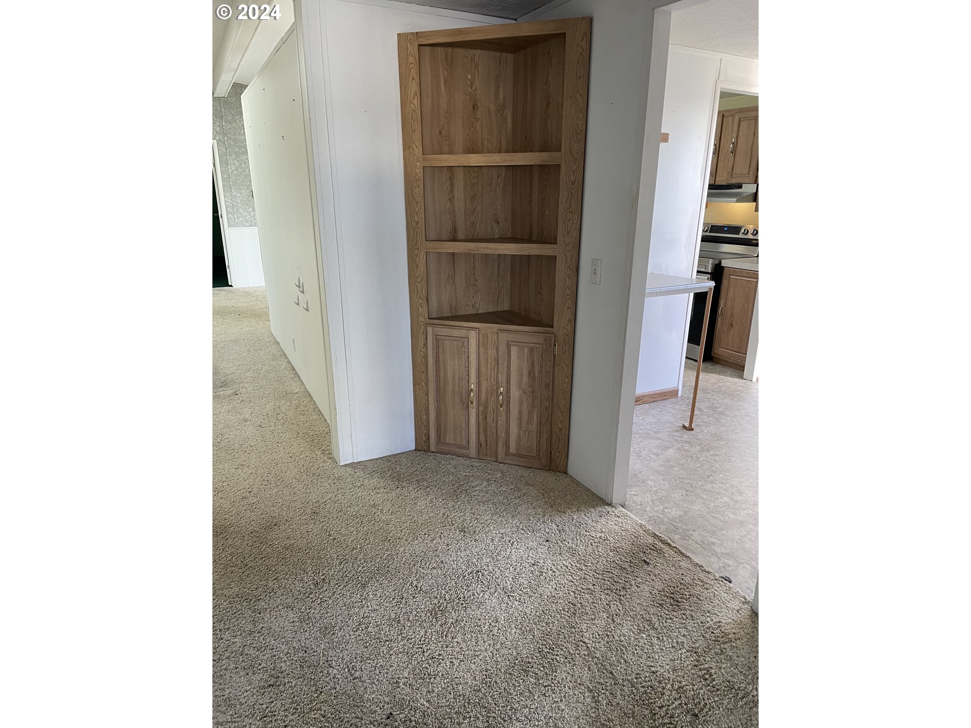 55096 Harrison Road Southwest Bandon, OR 97411 - Photo 7 of 34 a view of a hallway with closet