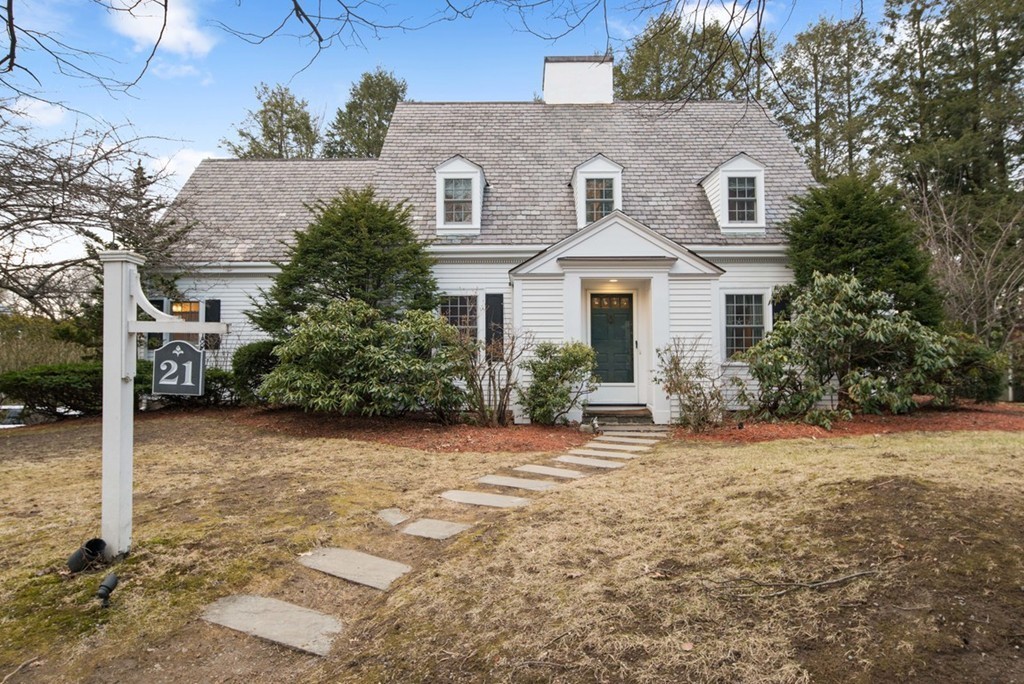 21 Fairway Road Brookline, MA 02467 - Photo 1 of 30 a front view of a house with a yard and garage