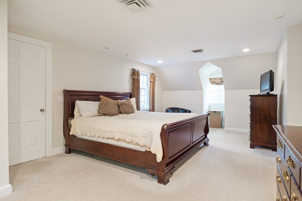 21 Fairway Road Brookline, MA 02467 - Photo 17 of 30 a bed room with a bed and a television