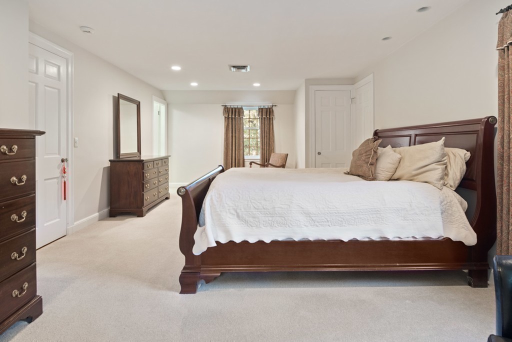 21 Fairway Road Brookline, MA 02467 - Photo 18 of 30 a bedroom with a bed and a night stand