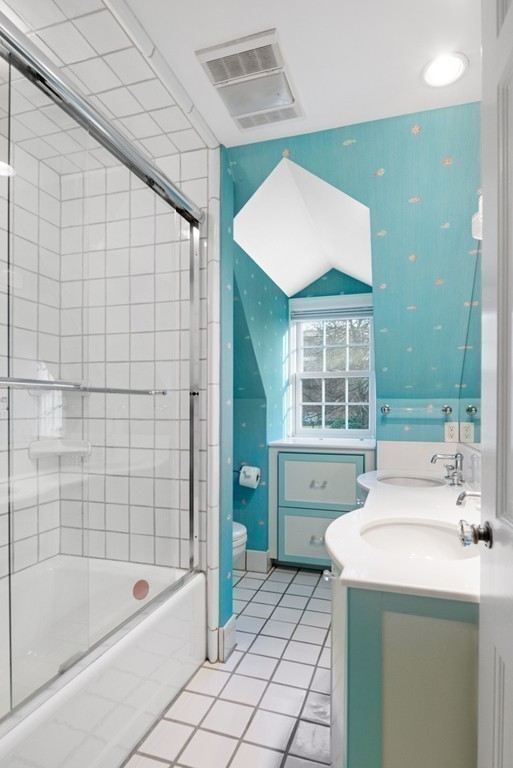 21 Fairway Road Brookline, MA 02467 - Photo 21 of 30 a bathroom with a sink and a bathtub