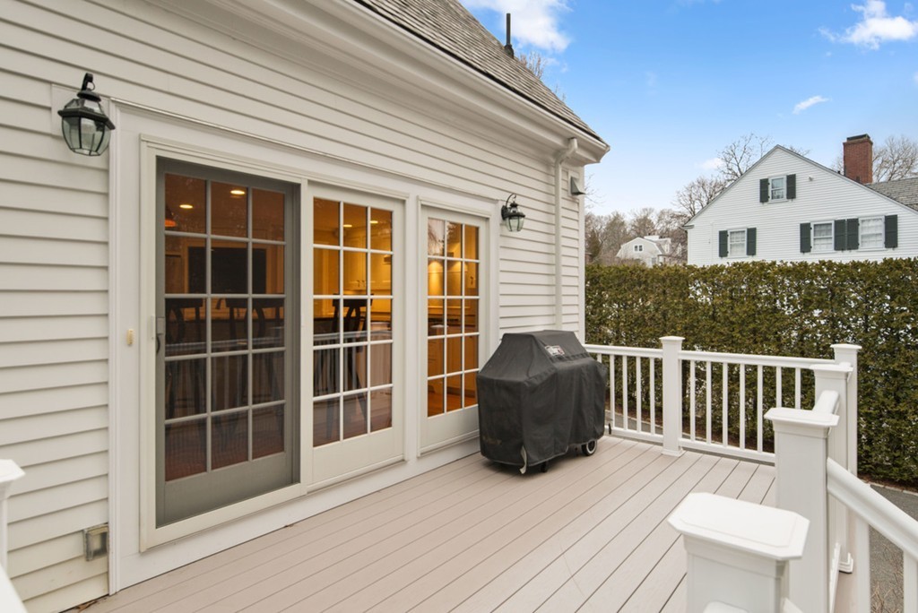 21 Fairway Road Brookline, MA 02467 - Photo 29 of 30 a view of roof deck with chair and wooden floor