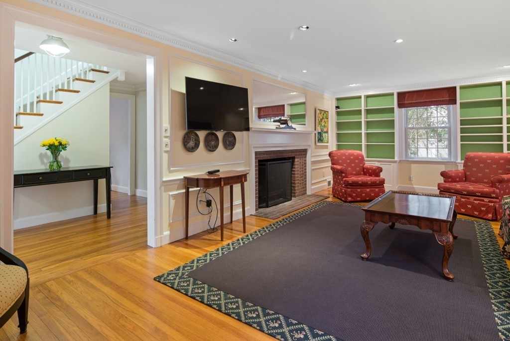 21 Fairway Road Brookline, MA 02467 - Photo 6 of 30 a living room with furniture fireplace and flat screen tv