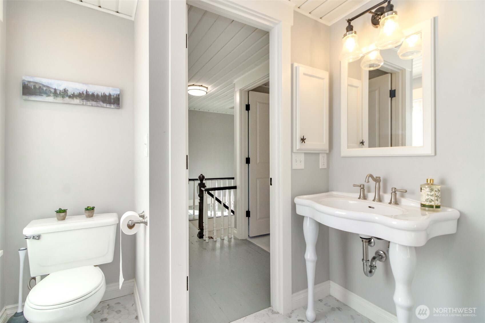 1514 Rainier Street Steilacoom, WA 98388 - Photo 28 of 37 a bathroom with a sink a toilet and shower