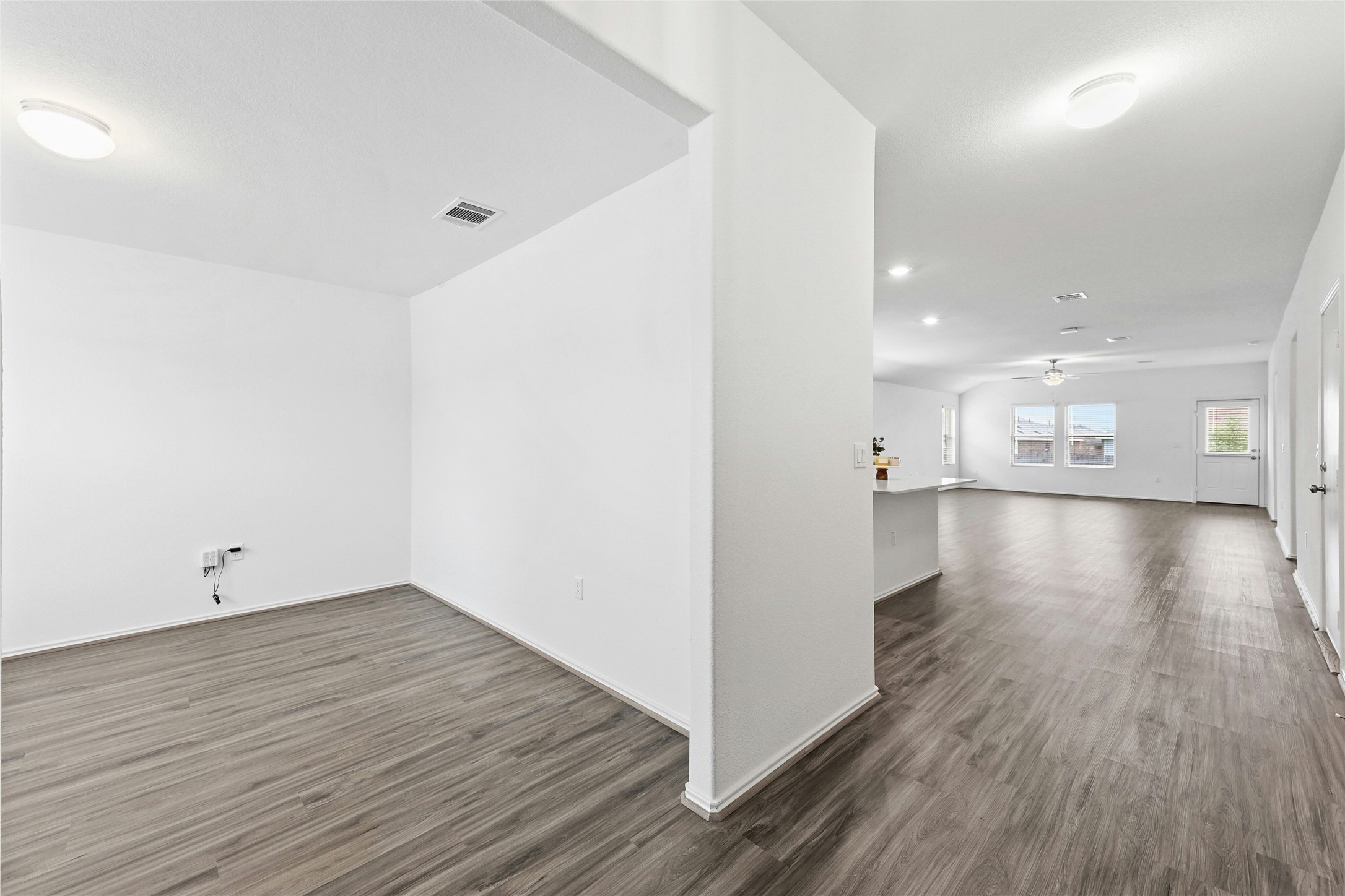 11813 Roscommon Trail Austin, TX 78754 - Photo 27 of 28 a view of a room with wooden floor
