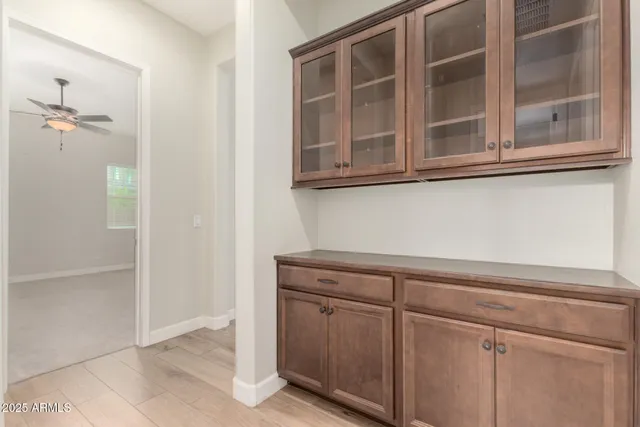a view of a kitchen with cabinets