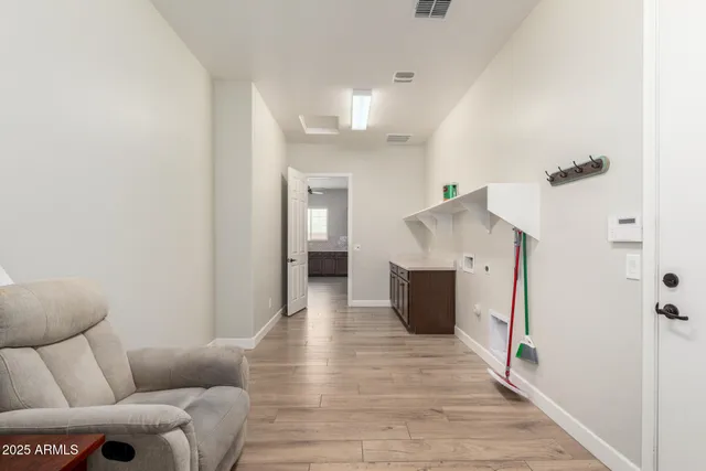 a living room with furniture and a couch