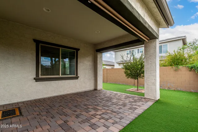 a view of porch with a yard