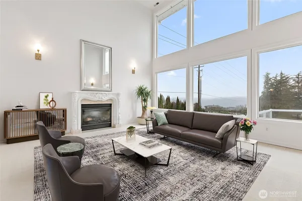 a view of empty room with a fireplace