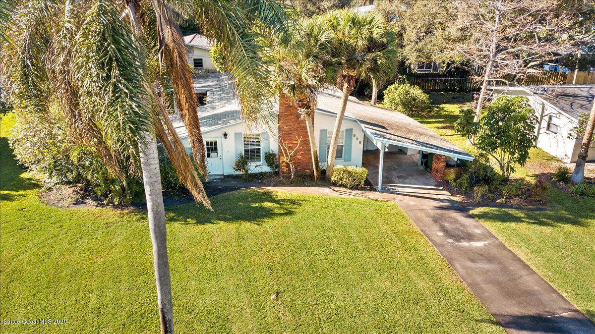 650 Java Road Cocoa Beach, FL 32931 - Photo 11 of 39 a front view of house with yard